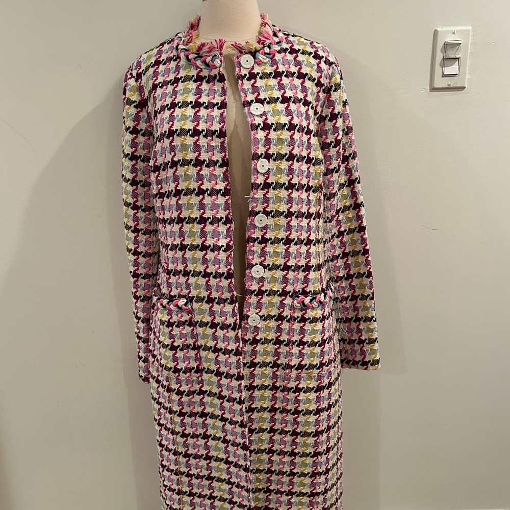 Oscar de la renta tweed long jacket.  Super chic and timeless!